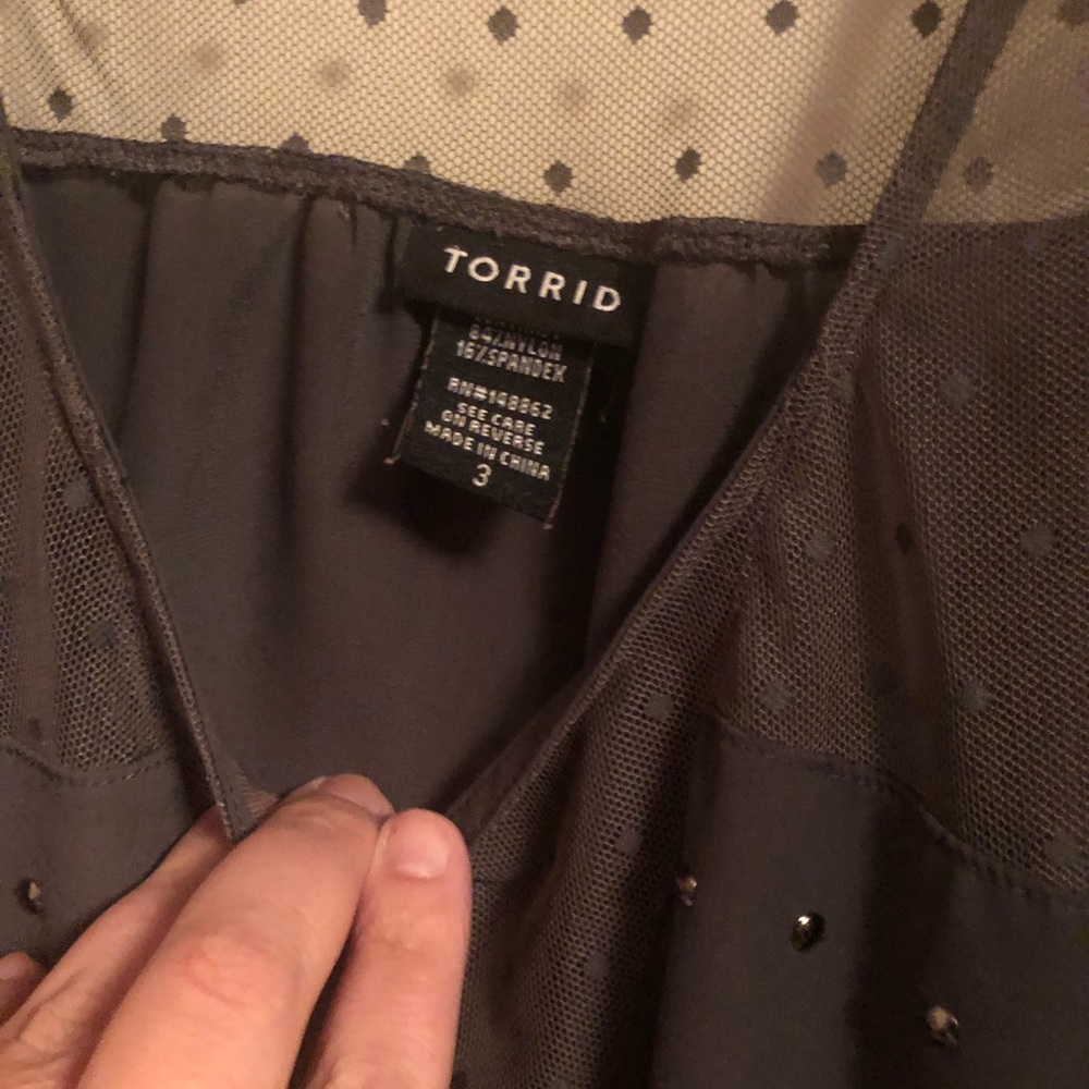 Woman’s torrid shirt size 3